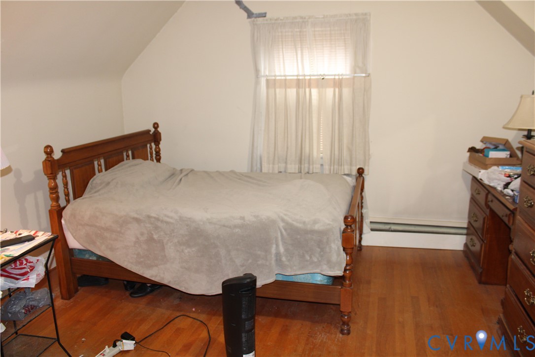 1215 Whitby Road Richmond, VA 23227 - Photo 8 of 13 Bedroom featuring vaulted ceiling and dark wood-st