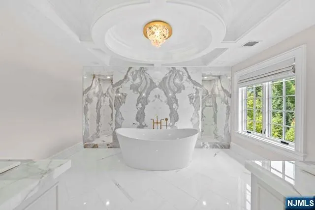 a kitchen with stainless steel appliances cabinets and a counter top space