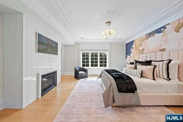 a bathroom with a double vanity sink toilet and shower