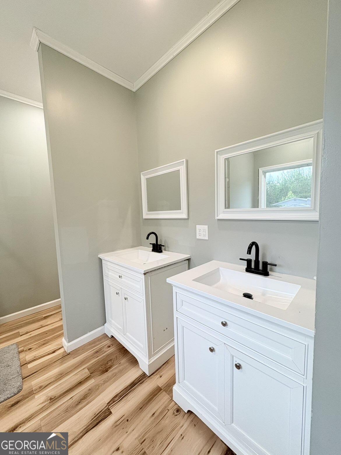 210 St Galilee Road Swainsboro, GA 30401 - Photo 12 of 18 a view of a bathroom with a sink and a mirror