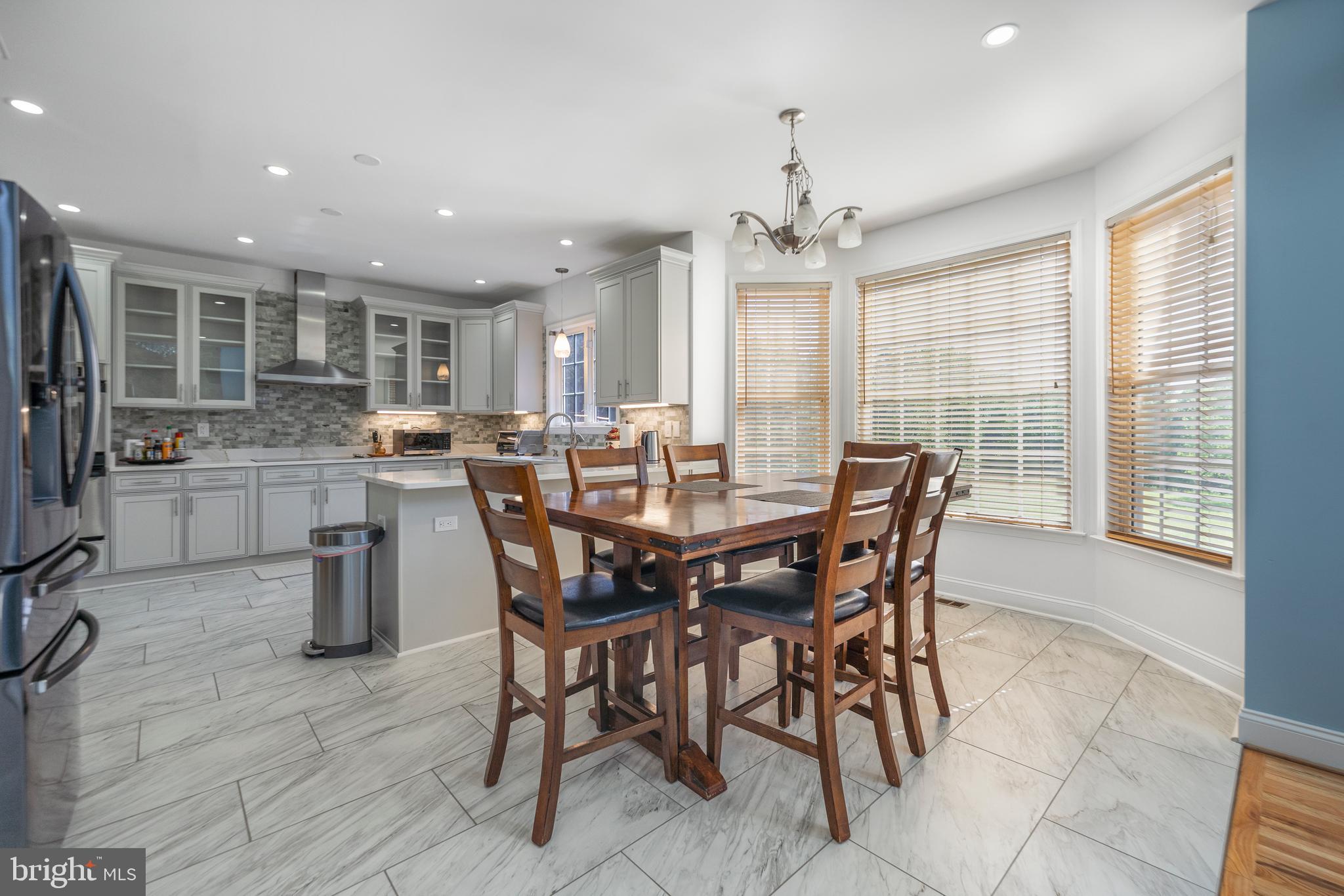 5100 Williams Wharf Road St. Leonard, MD 20685 - Photo 20 of 63 a view of a dining room with furniture window and outside view