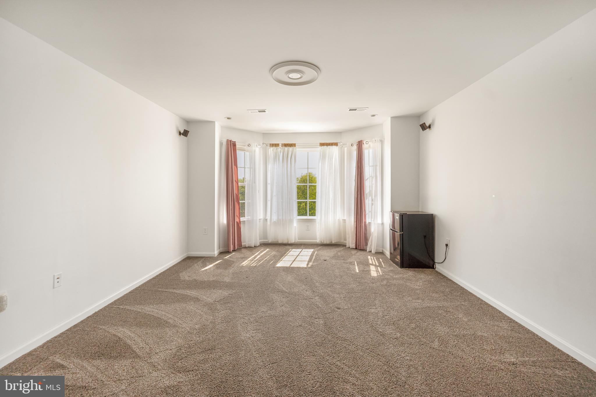 5100 Williams Wharf Road St. Leonard, MD 20685 - Photo 27 of 63 a view of an empty room with a window