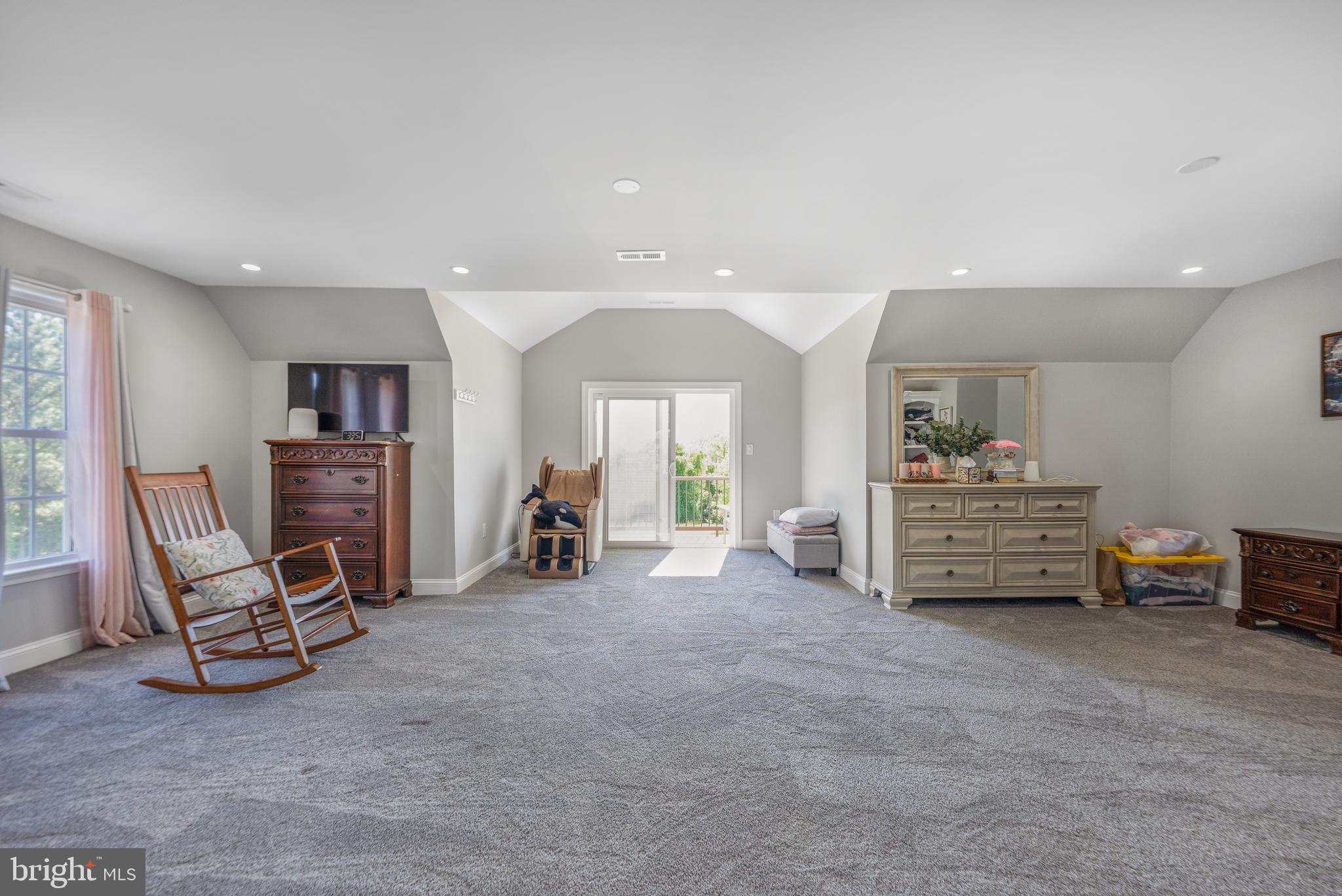 5100 Williams Wharf Road St. Leonard, MD 20685 - Photo 28 of 63 a view of a livingroom with furniture and a flat screen tv