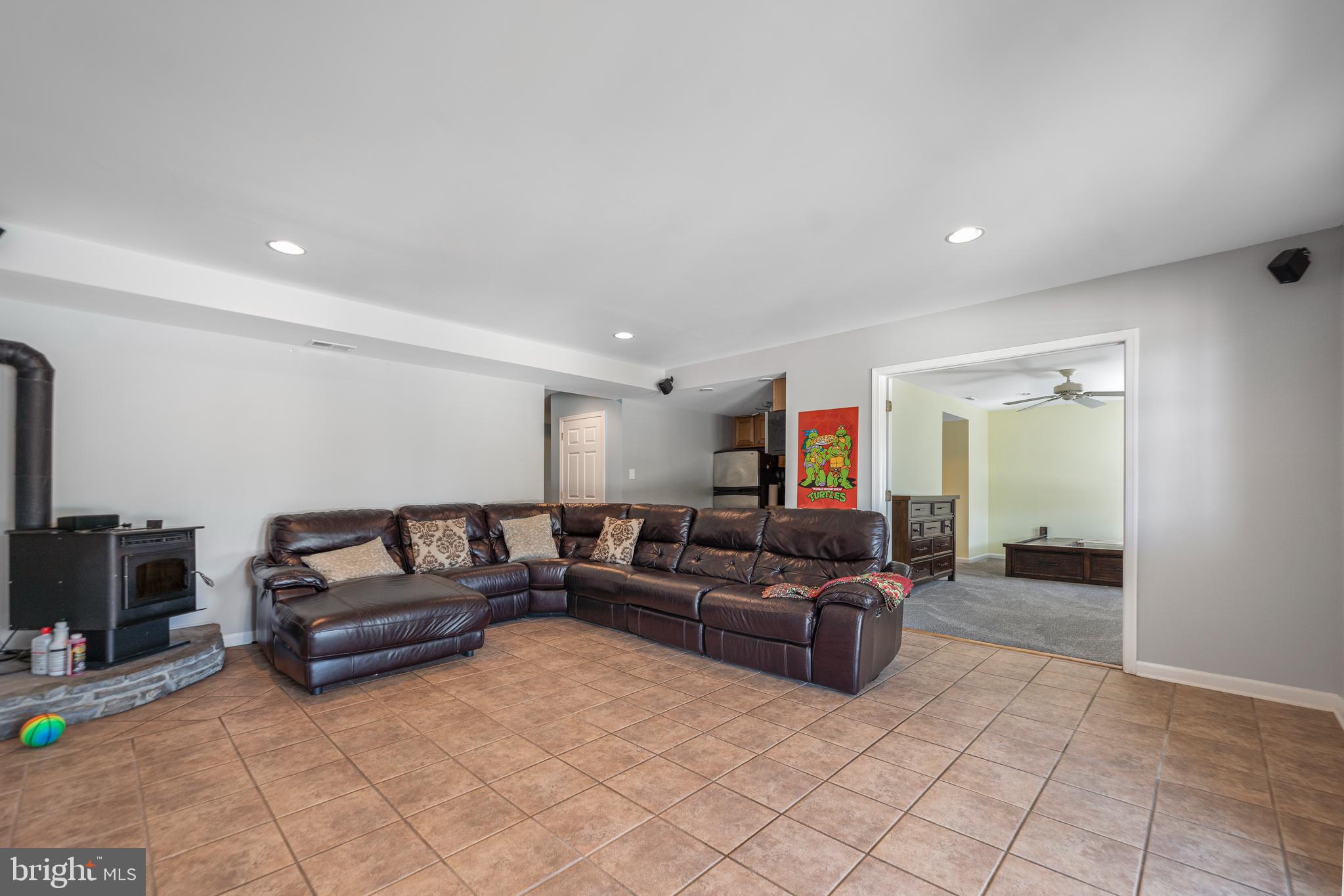 5100 Williams Wharf Road St. Leonard, MD 20685 - Photo 34 of 63 a living room with furniture and a flat screen tv