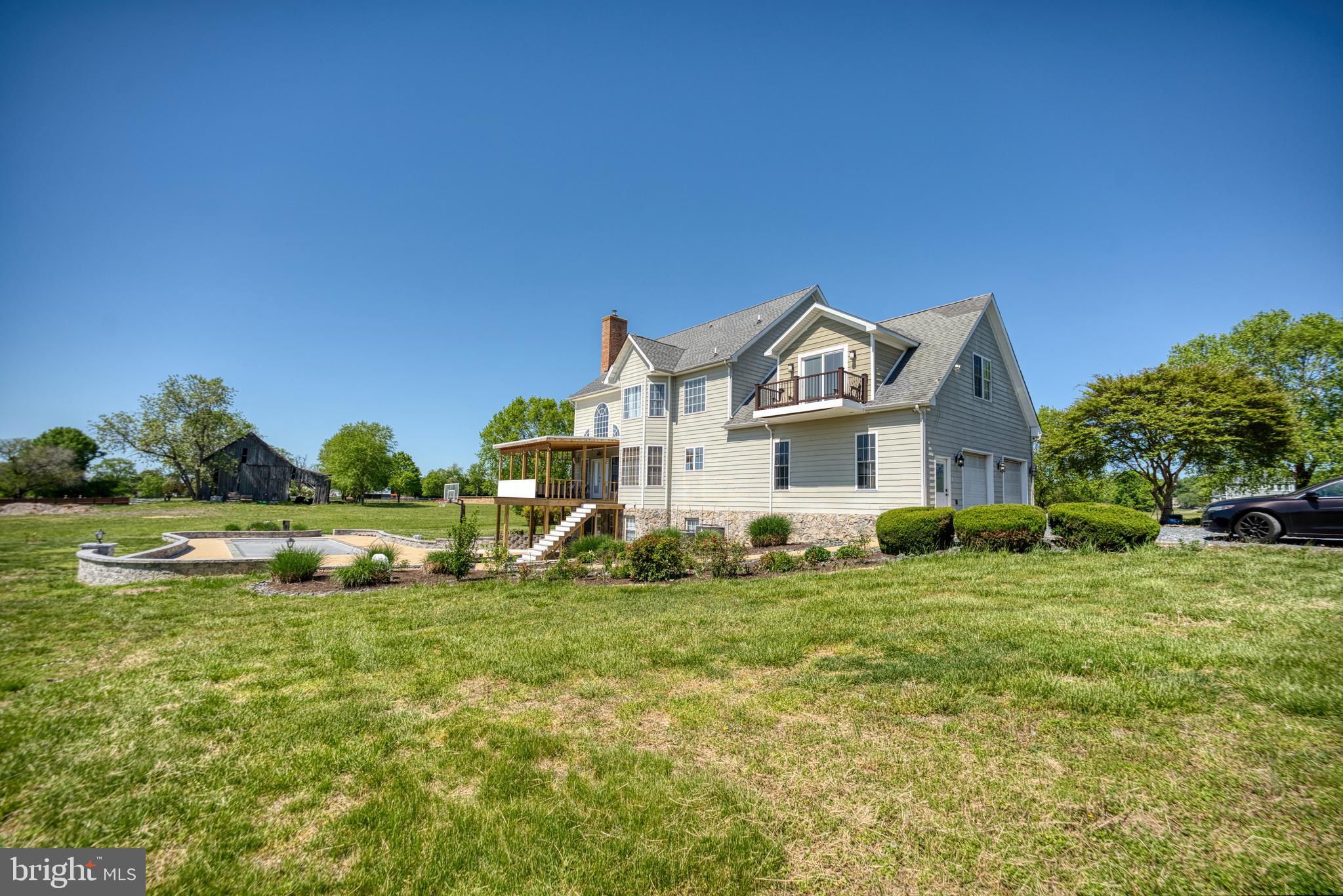 5100 Williams Wharf Road St. Leonard, MD 20685 - Photo 44 of 63 a front view of a house with a yard