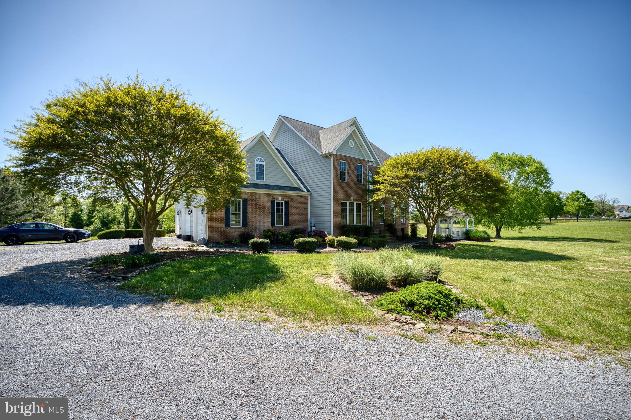 5100 Williams Wharf Road St. Leonard, MD 20685 - Photo 46 of 63 a front view of a house with garden