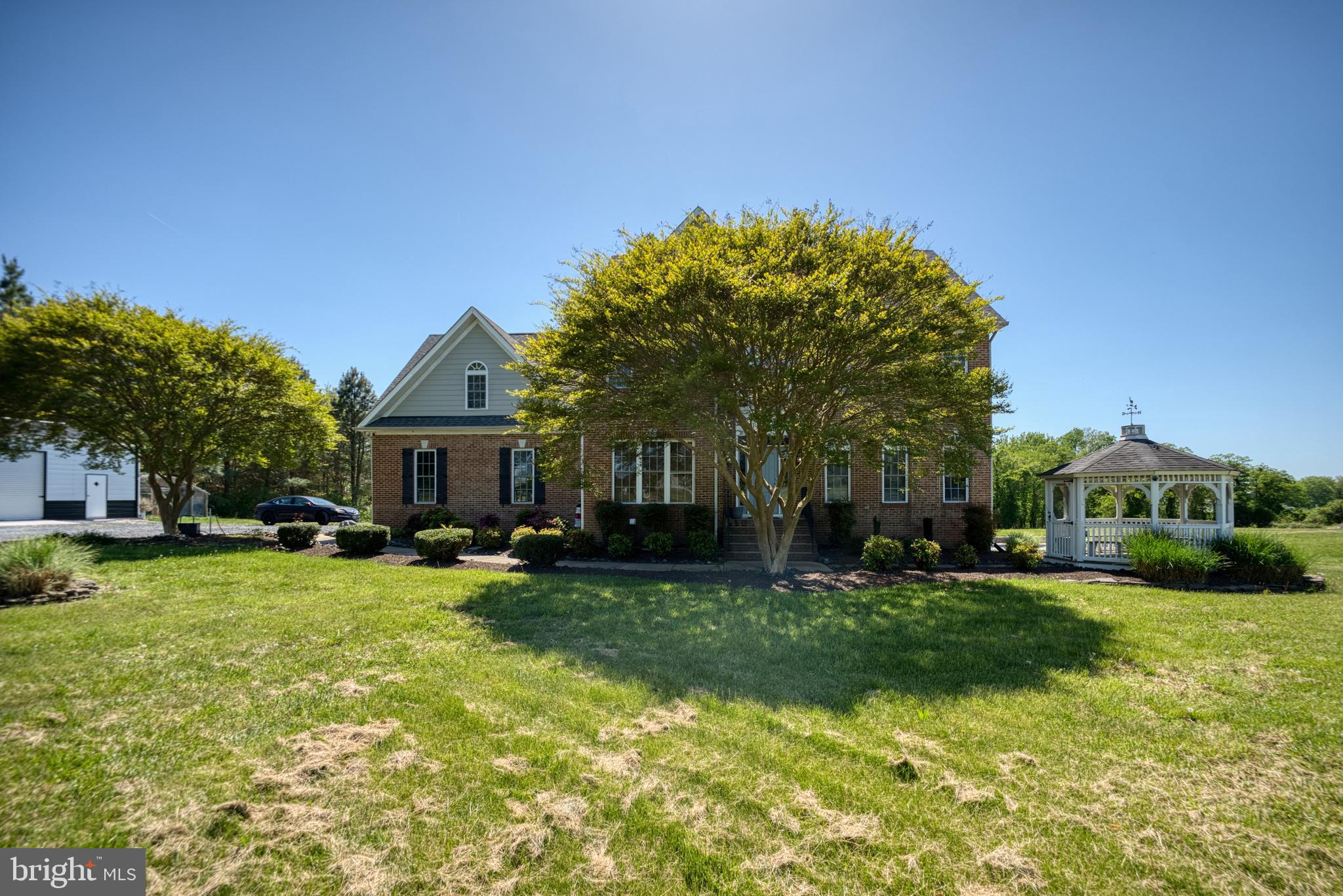 5100 Williams Wharf Road St. Leonard, MD 20685 - Photo 47 of 63 a front view of house with yard and green space