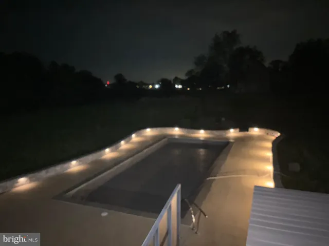 a view of a garage with parked cars
