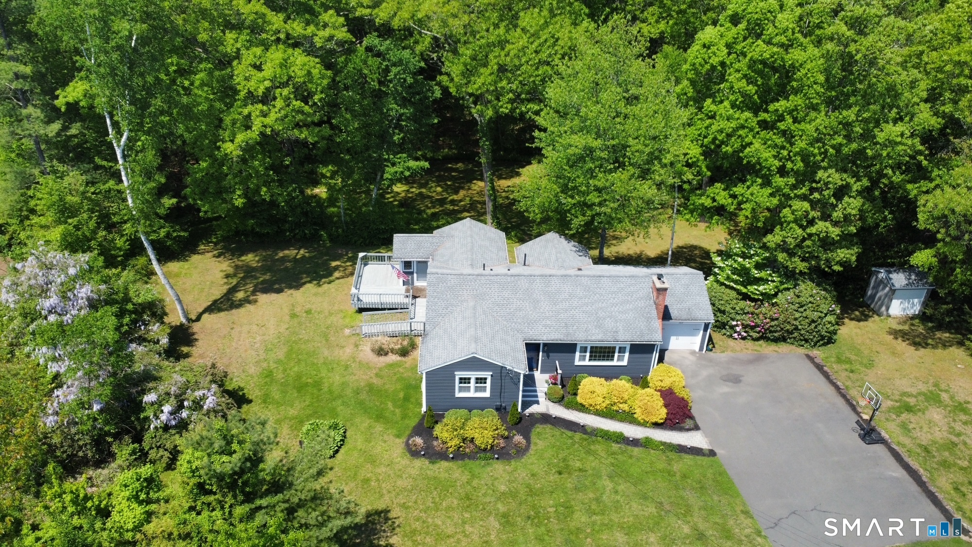 1013 Ratley Road Suffield, CT 06093 - Photo 36 of 39 an aerial view of a house with swimming pool big yard and large trees