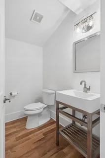 a view of an empty room with a kitchen
