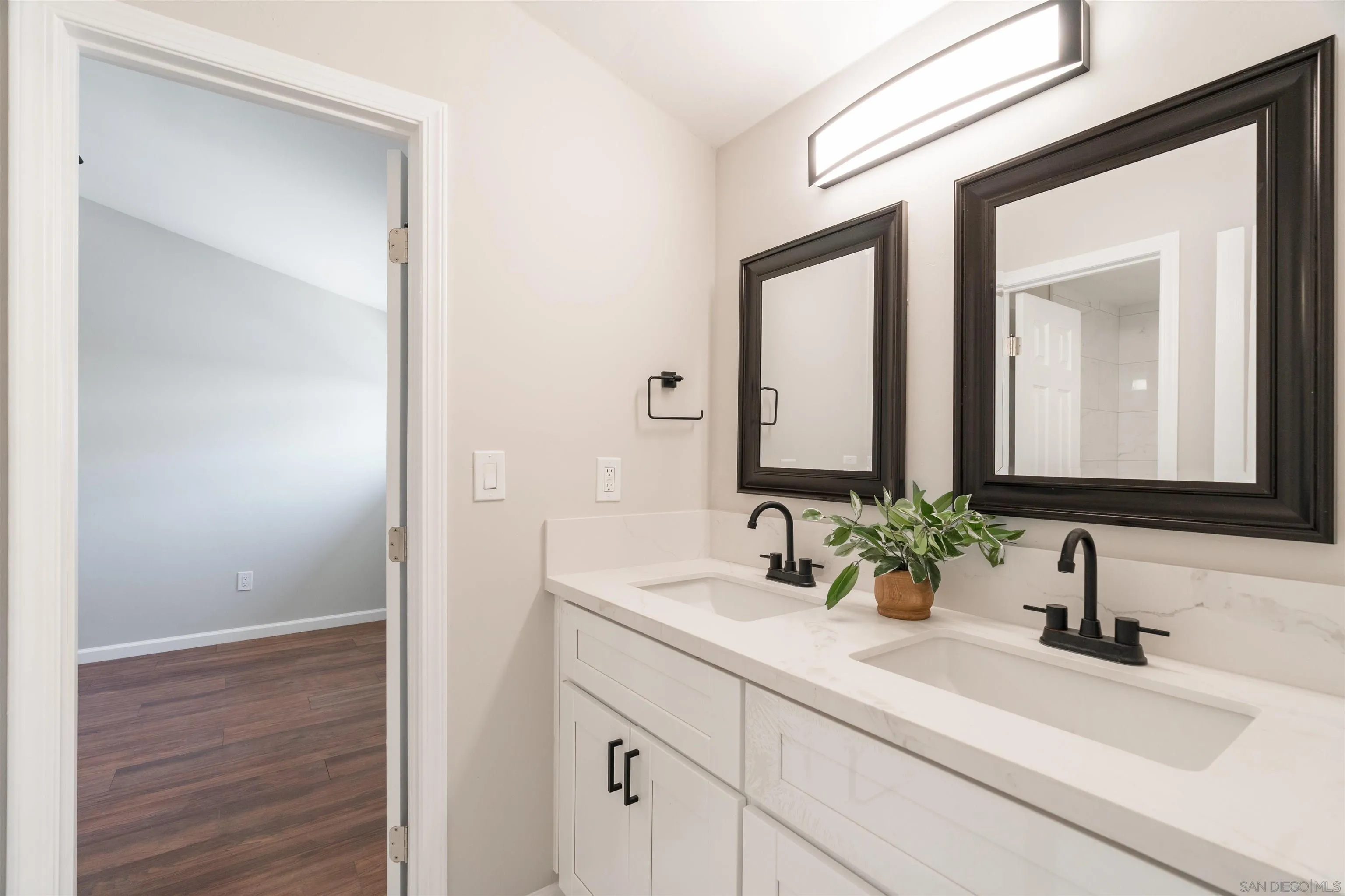 11570 Johnson Lake Road Lakeside, CA 92040 - Photo 18 of 36 a bathroom with a sink and a mirror