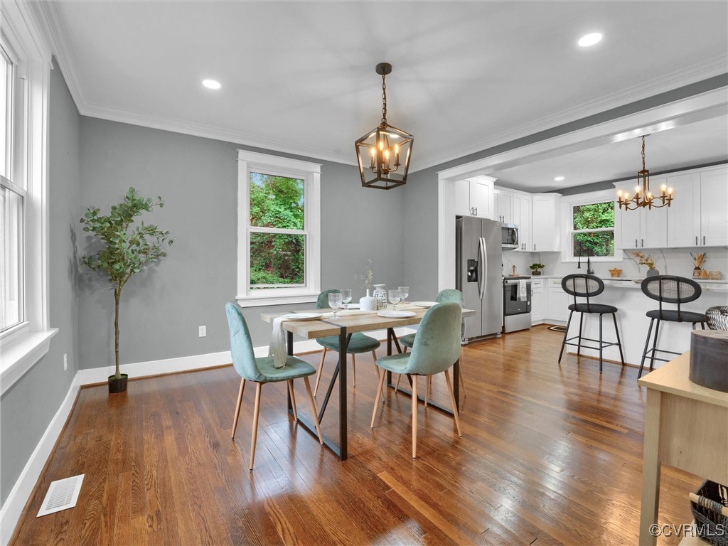 4819 Rodney Road Richmond, VA 23230 - Photo 11 of 40 Dining area with dark hardwood / wood-style floors