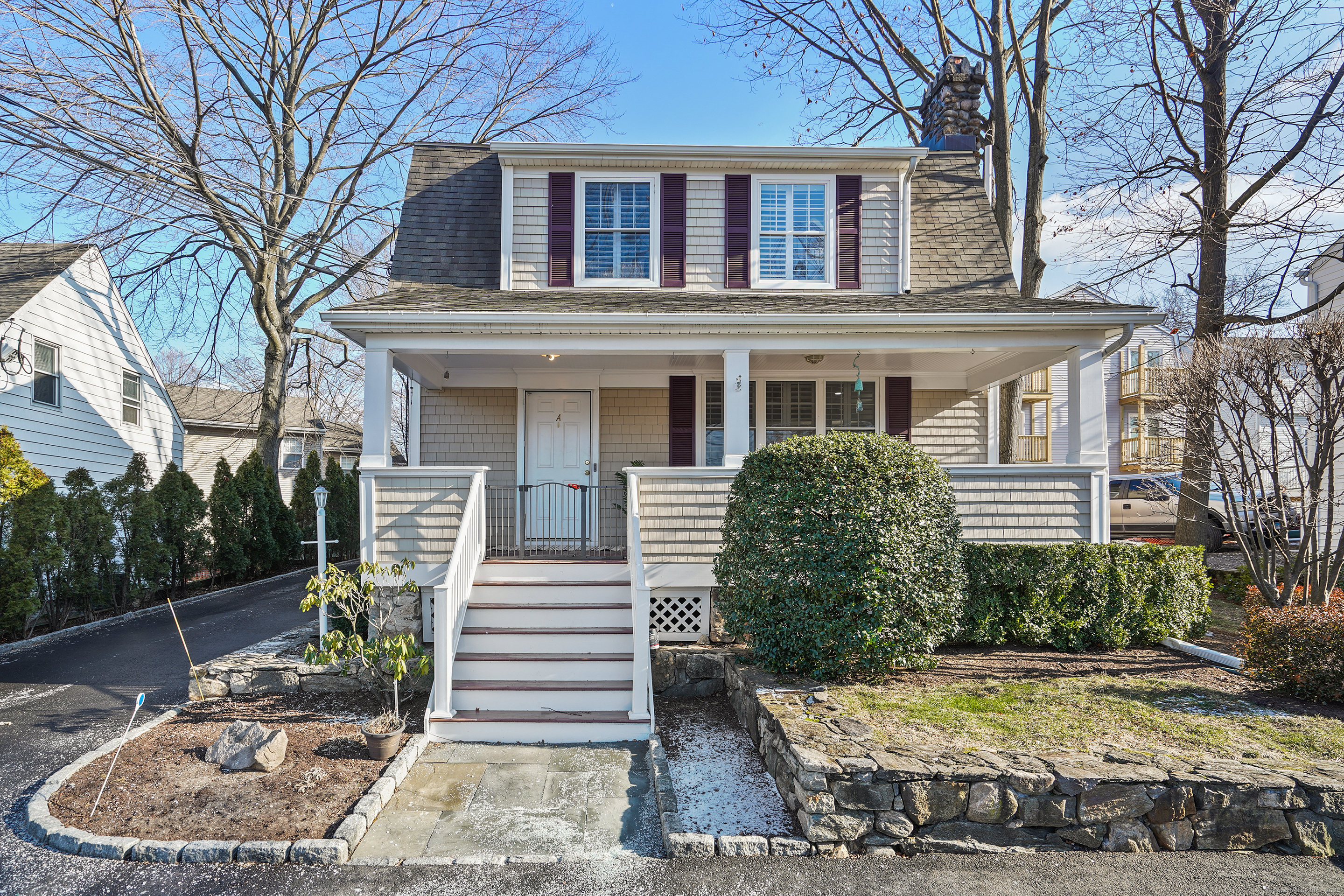 a front view of a house with entertaining space