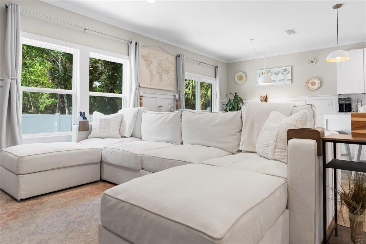 633 West Pope Road St. Augustine, FL 32080 - Photo 12 of 43 a living room with furniture and a large window