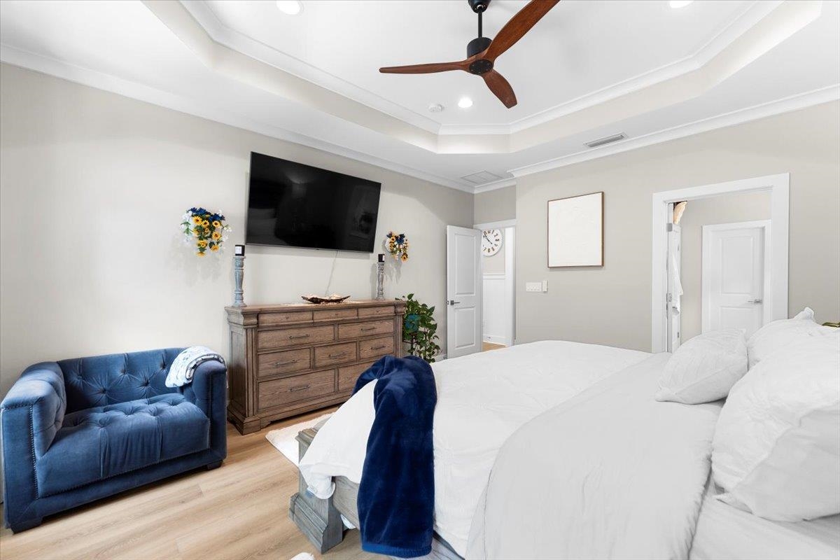 633 West Pope Road St. Augustine, FL 32080 - Photo 19 of 43 a living room with furniture and a flat screen tv