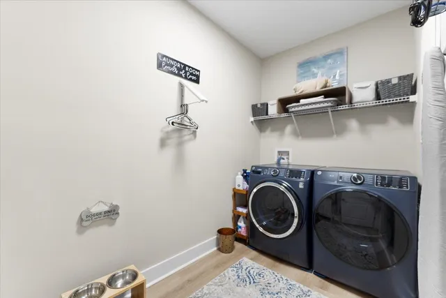 a utility room with dryer and washer
