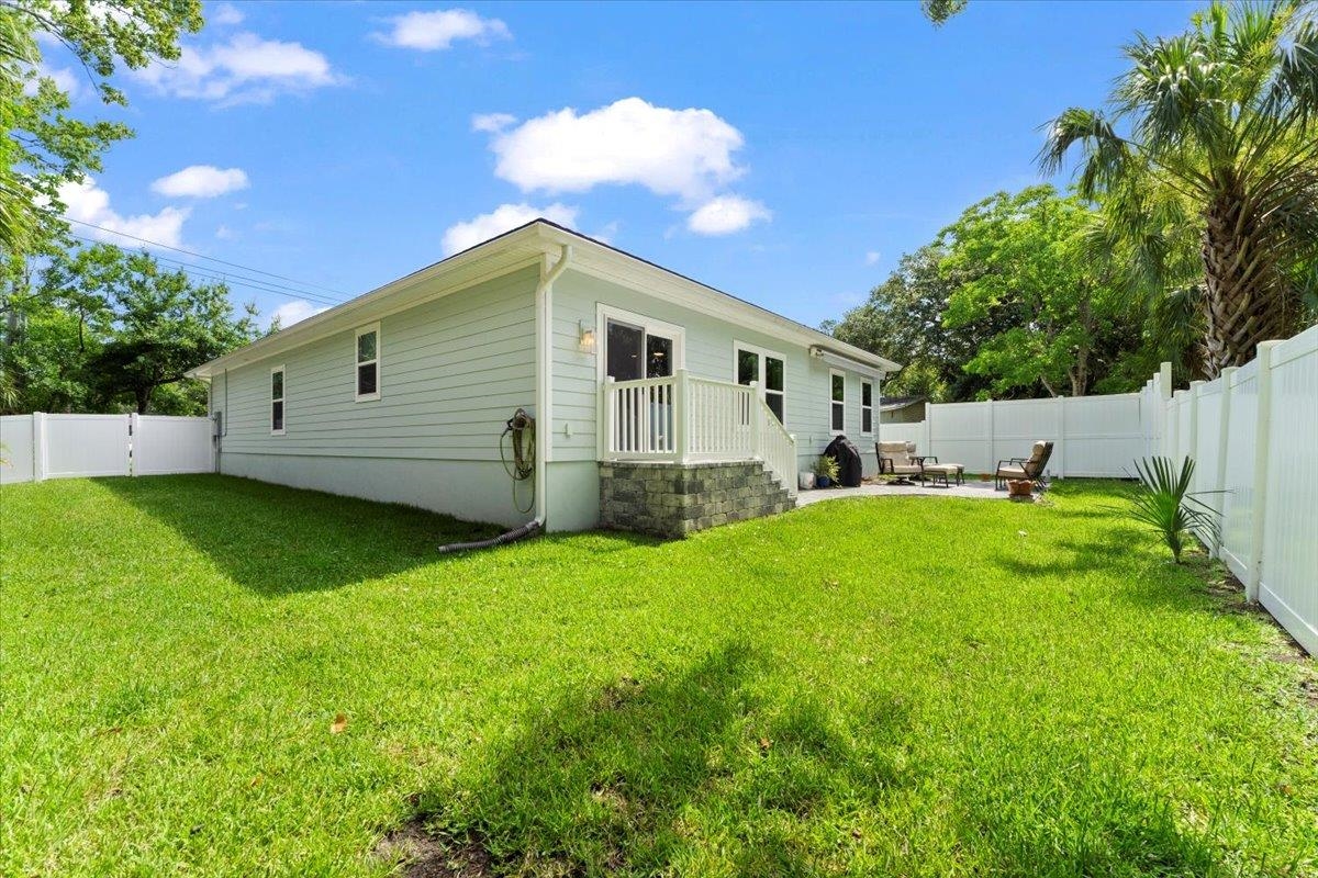 633 West Pope Road St. Augustine, FL 32080 - Photo 29 of 43 a view of a house with backyard