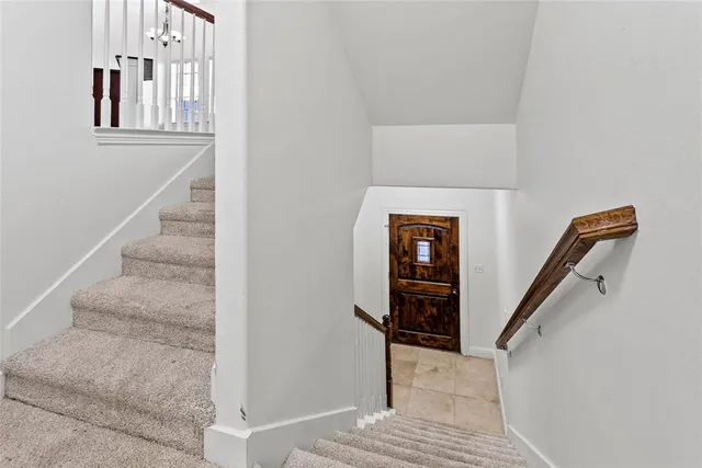 a view of a livingroom with an empty space and a window