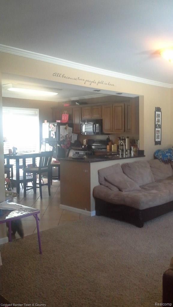 13096 Torrey Road Fenton, MI 48430 - Photo 3 of 36 Living room with view of kitchen