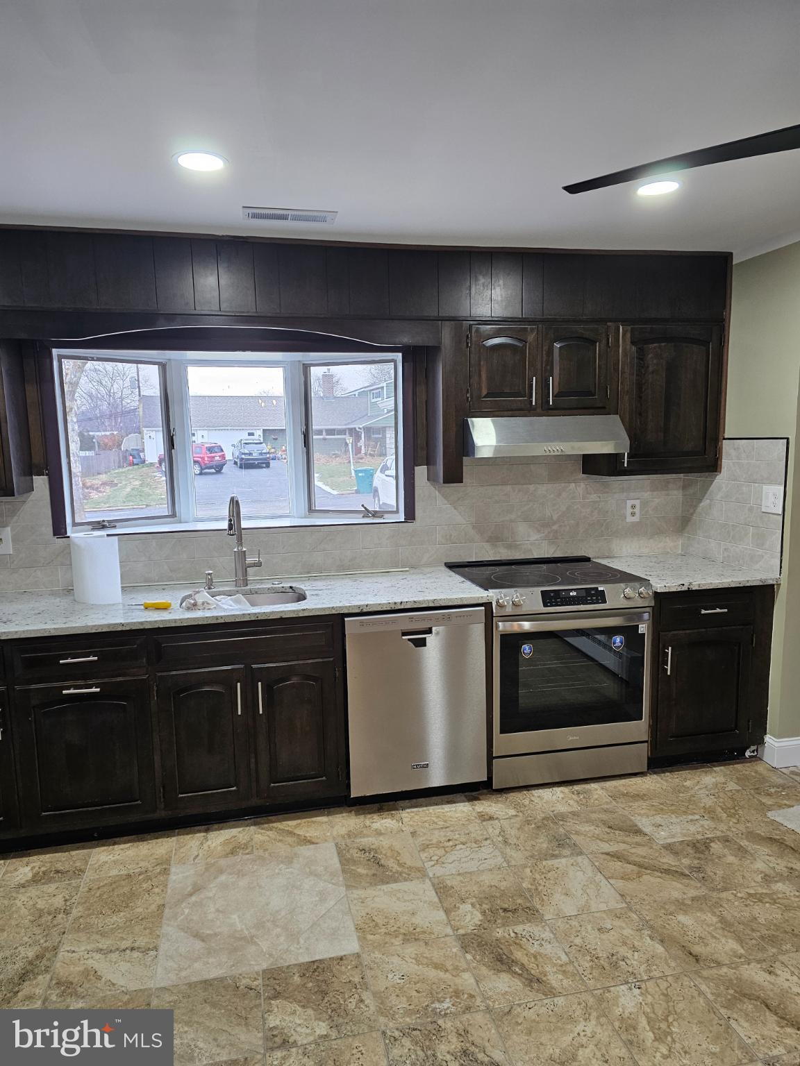 65 Silverspruce Road Levittown, PA 19056 - Photo 7 of 24 Modern fully equipped kitchen with new bay window.