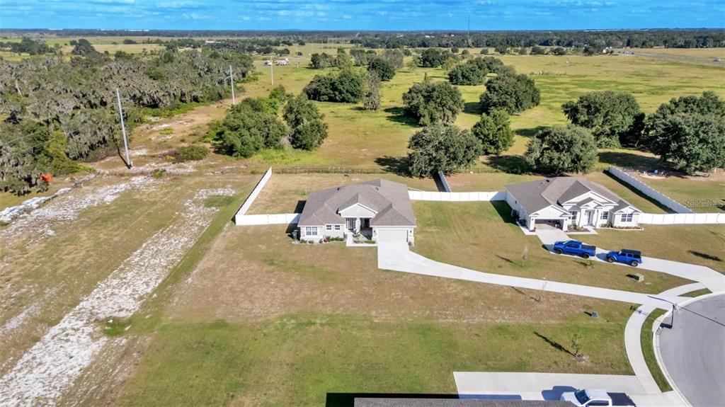 940 Lochland Loop Bartow, FL 33830 - Photo 2 of 2 an aerial view of a house with a ocean view