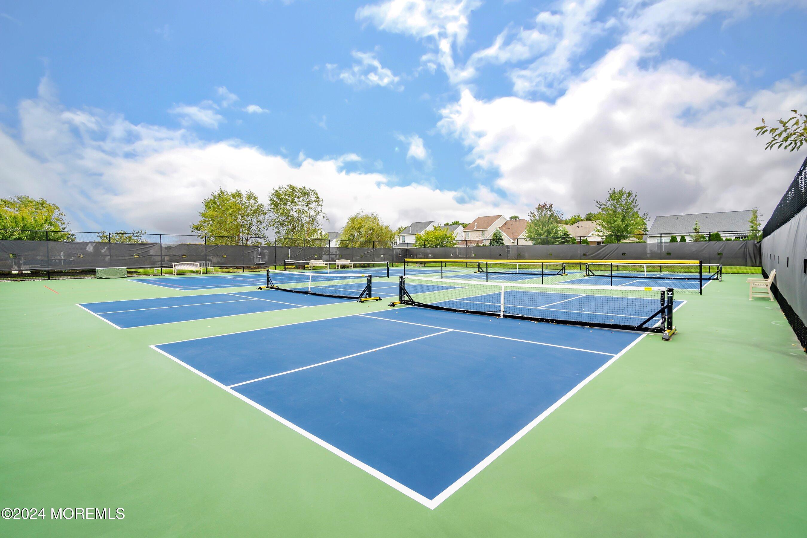 92 Ambermist Way Forked River, NJ 08731 - Photo 49 of 51 a view of an outdoor space and tennis court
