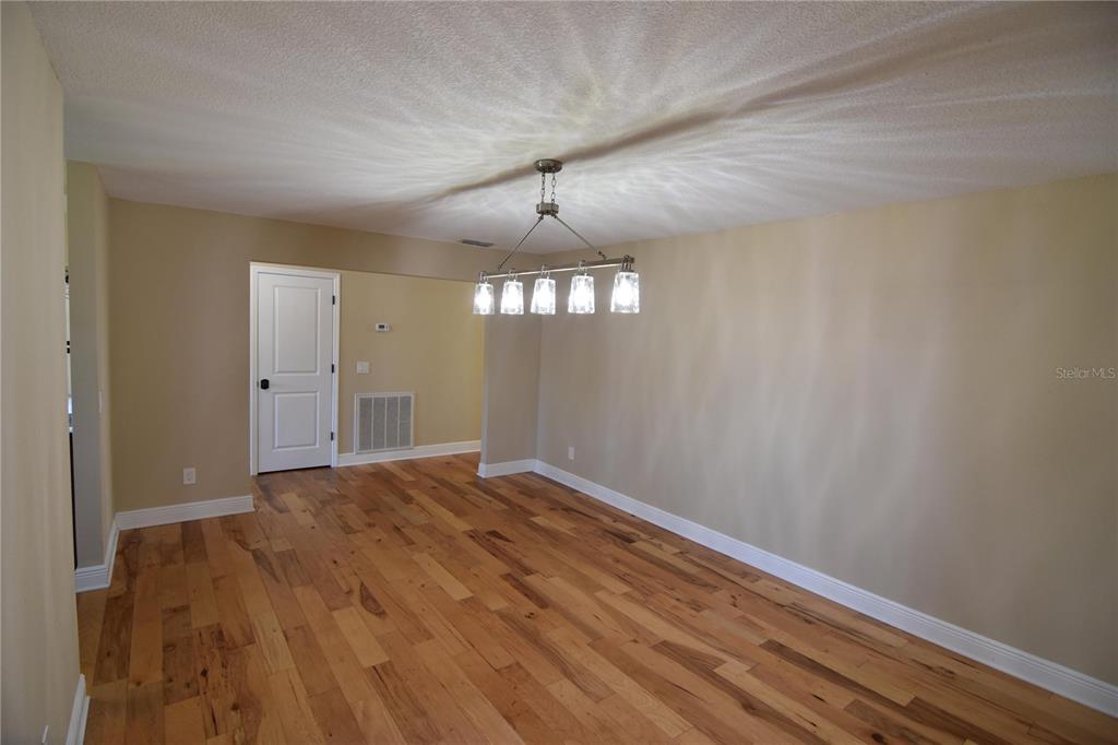 3233 Hickory Tree Road St. Cloud, FL 34772 - Photo 8 of 23 a view of an empty room with a window