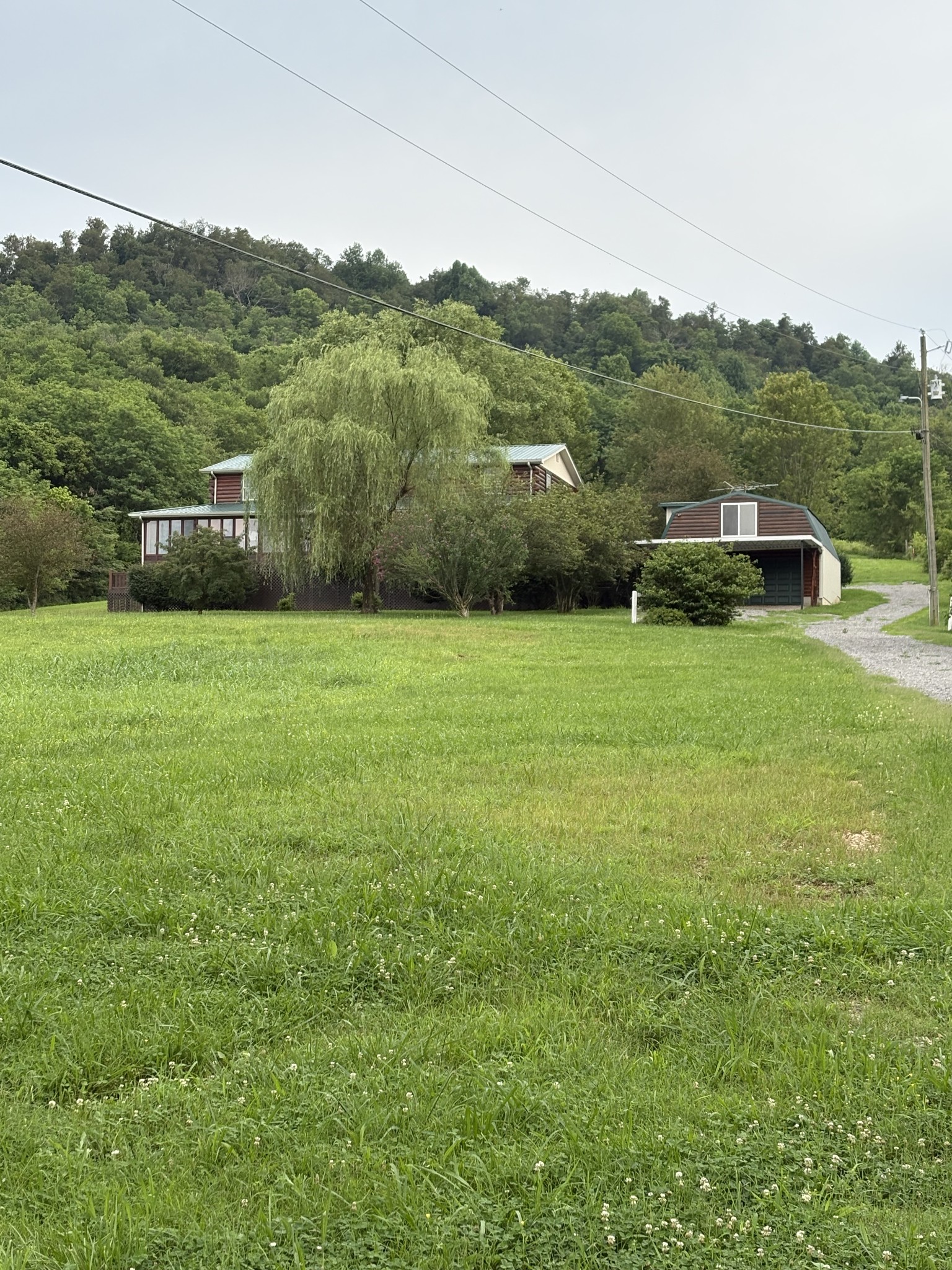 1028 Cook Road Liberty, TN 37095 - Photo 3 of 33 a view of a big yard with green space