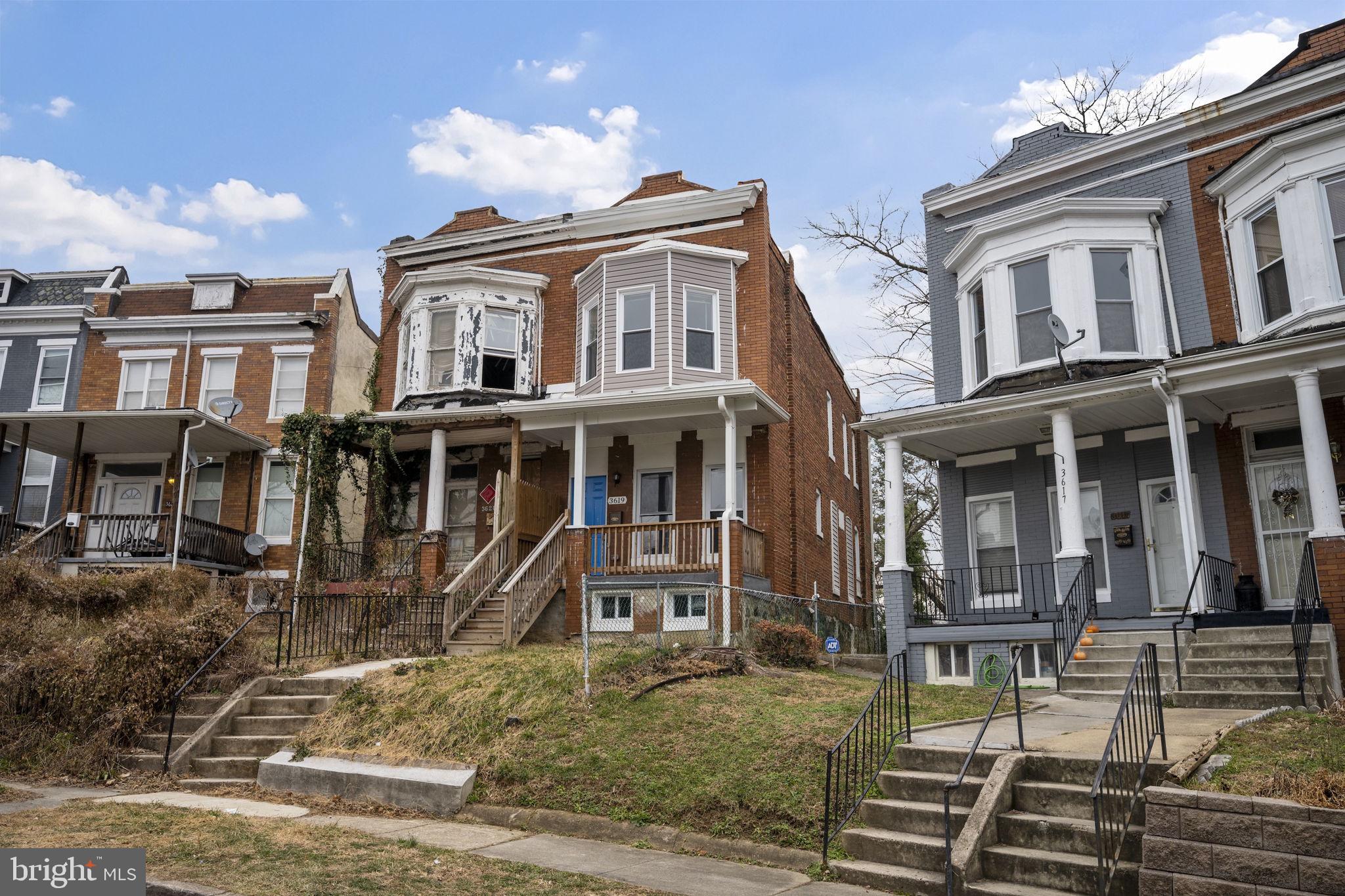 front view of a house with a yard