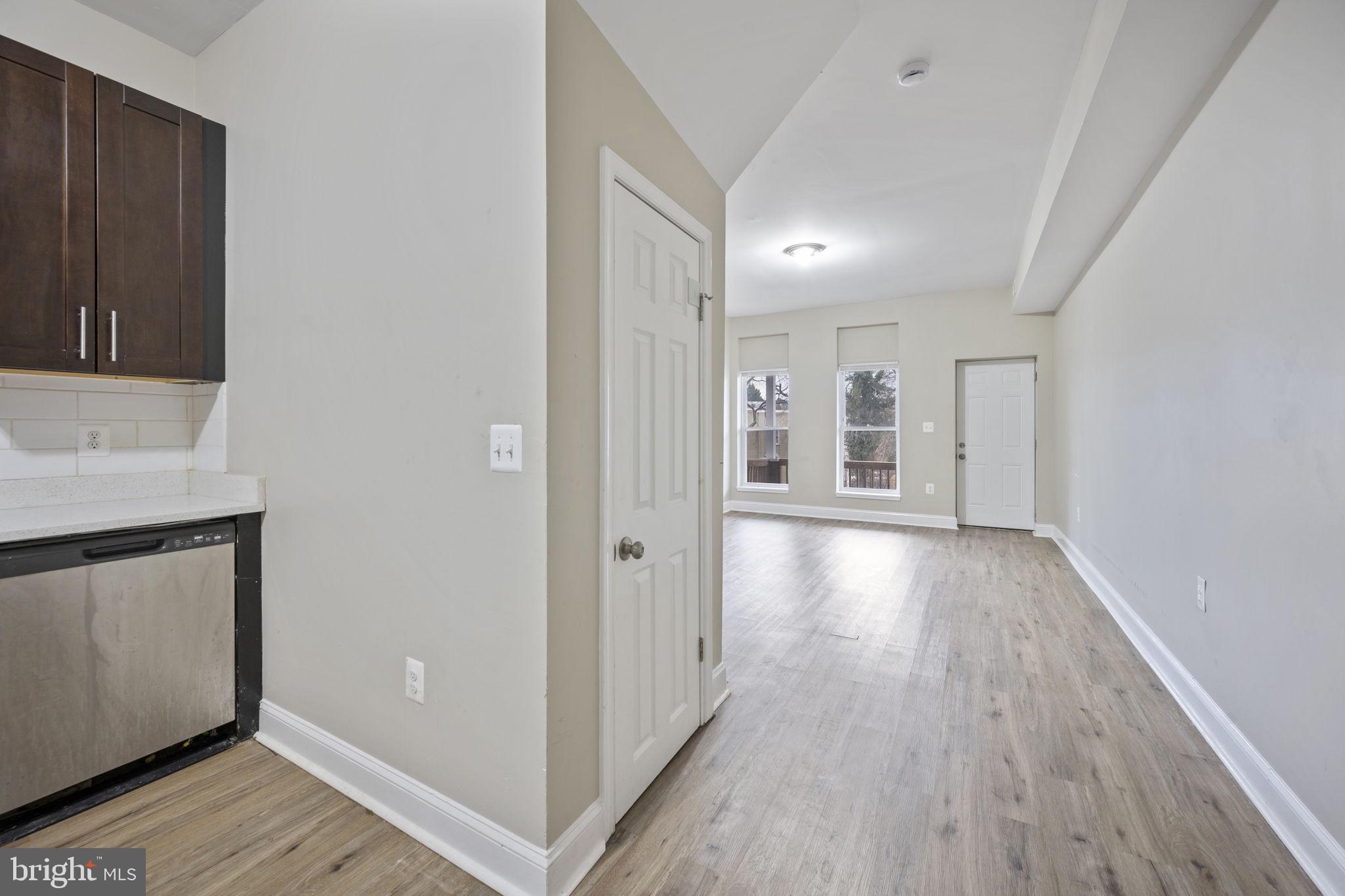 3619 Cottage Avenue Baltimore, MD 21215 - Photo 11 of 31 a view of hallway with wooden floor