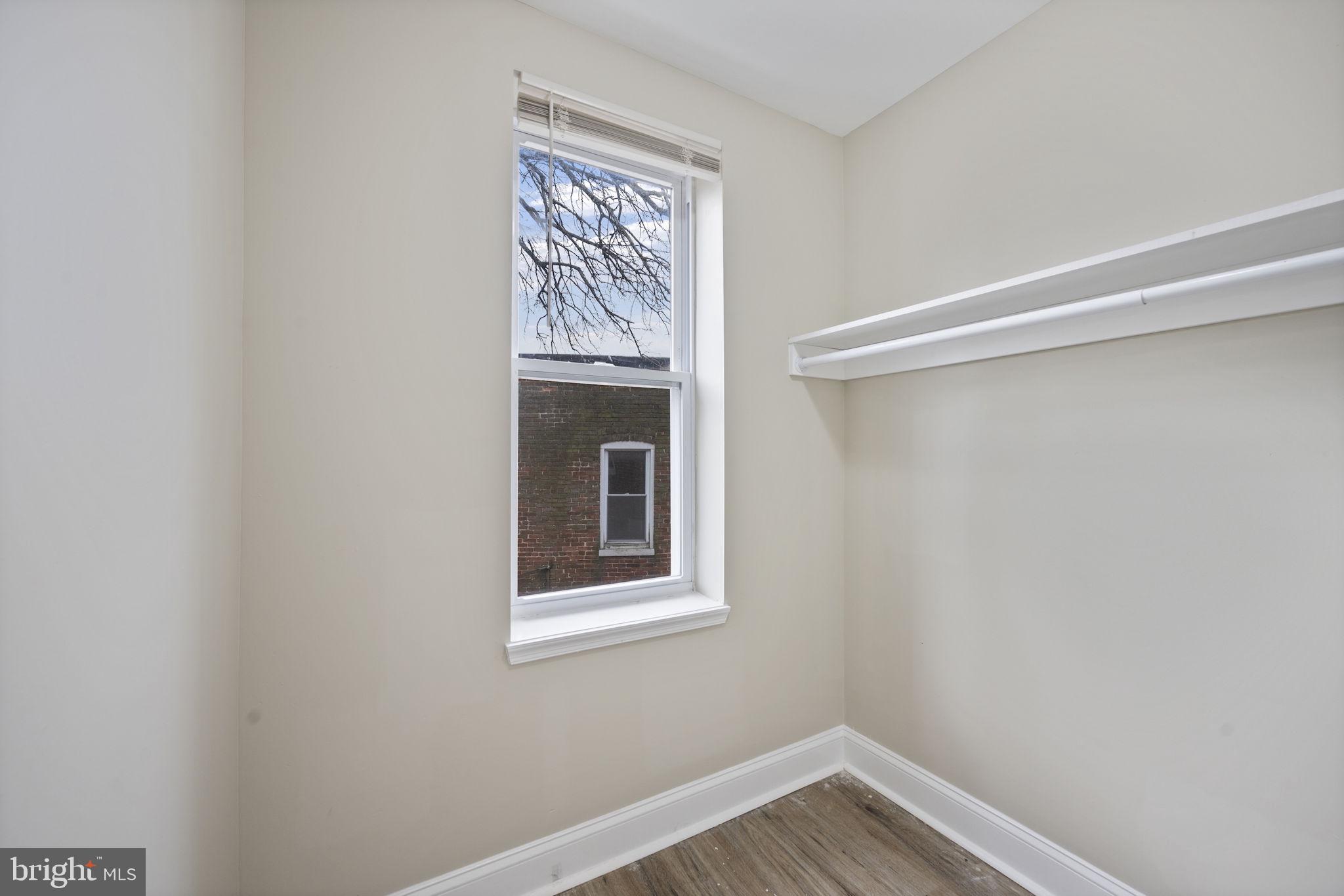 3619 Cottage Avenue Baltimore, MD 21215 - Photo 18 of 31 a view of empty room with window