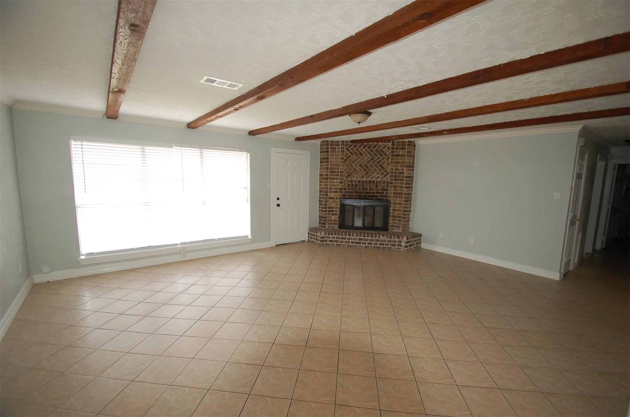 3338 Walhalla Drive Houston, TX 77066 - Photo 3 of 18 Den with fire place