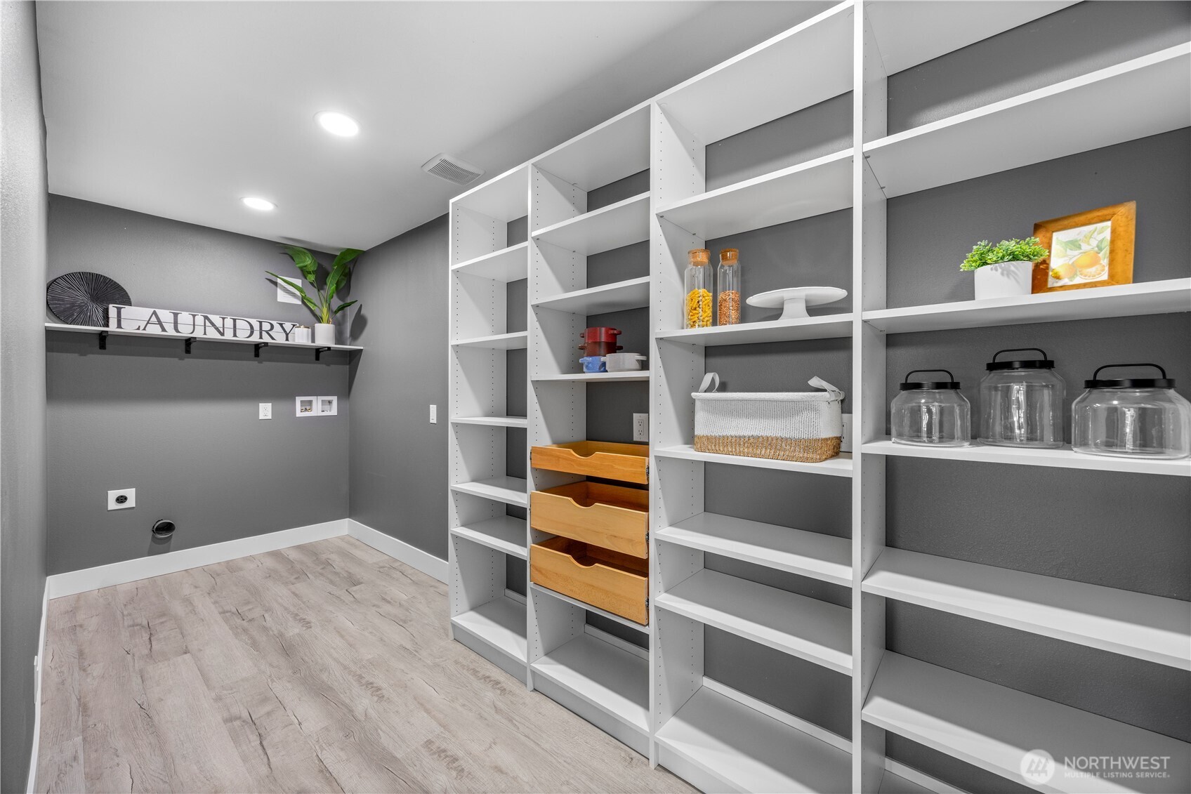 9371 Willamette Meridian Road Northwest Silverdale, WA 98383 - Photo 19 of 40 a view of walk in closet with empty racks