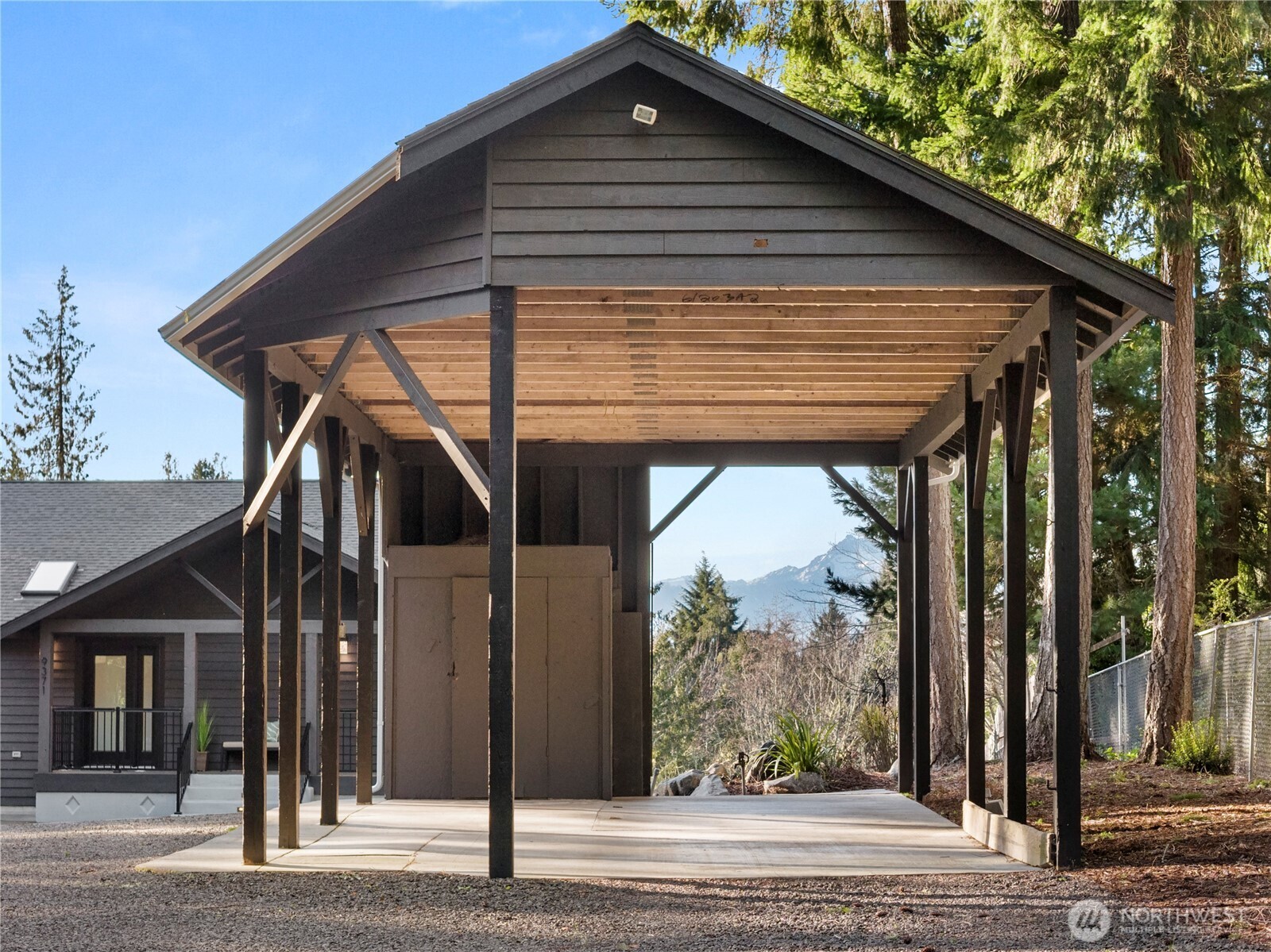 9371 Willamette Meridian Road Northwest Silverdale, WA 98383 - Photo 39 of 40 a front view of a house with a porch
