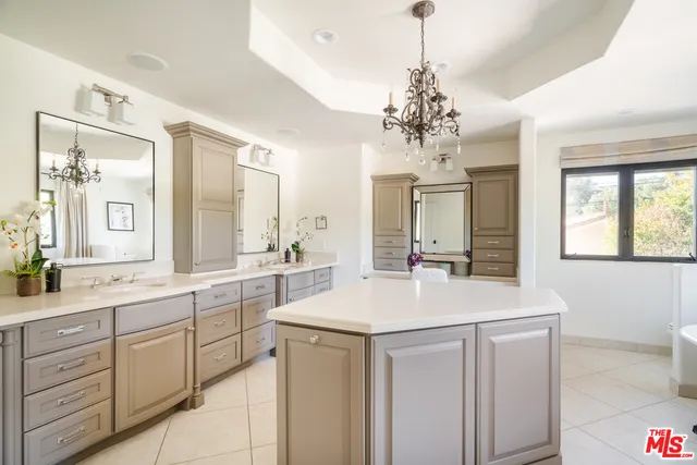 a room with sink and window