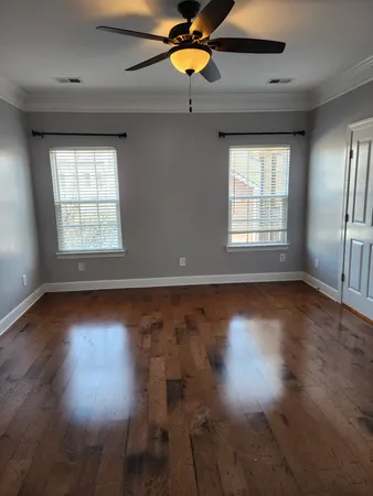 a bathroom with a shower and a sink