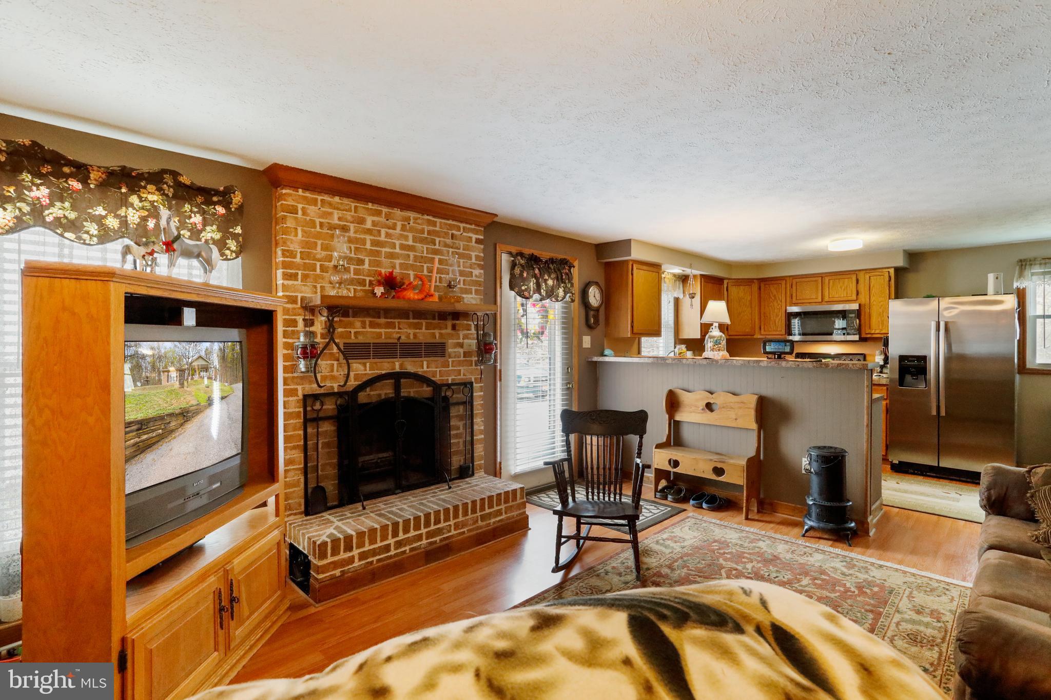 1447 Hoffmaster Road Knoxville, MD 21758 - Photo 22 of 36 Cozy fireplace