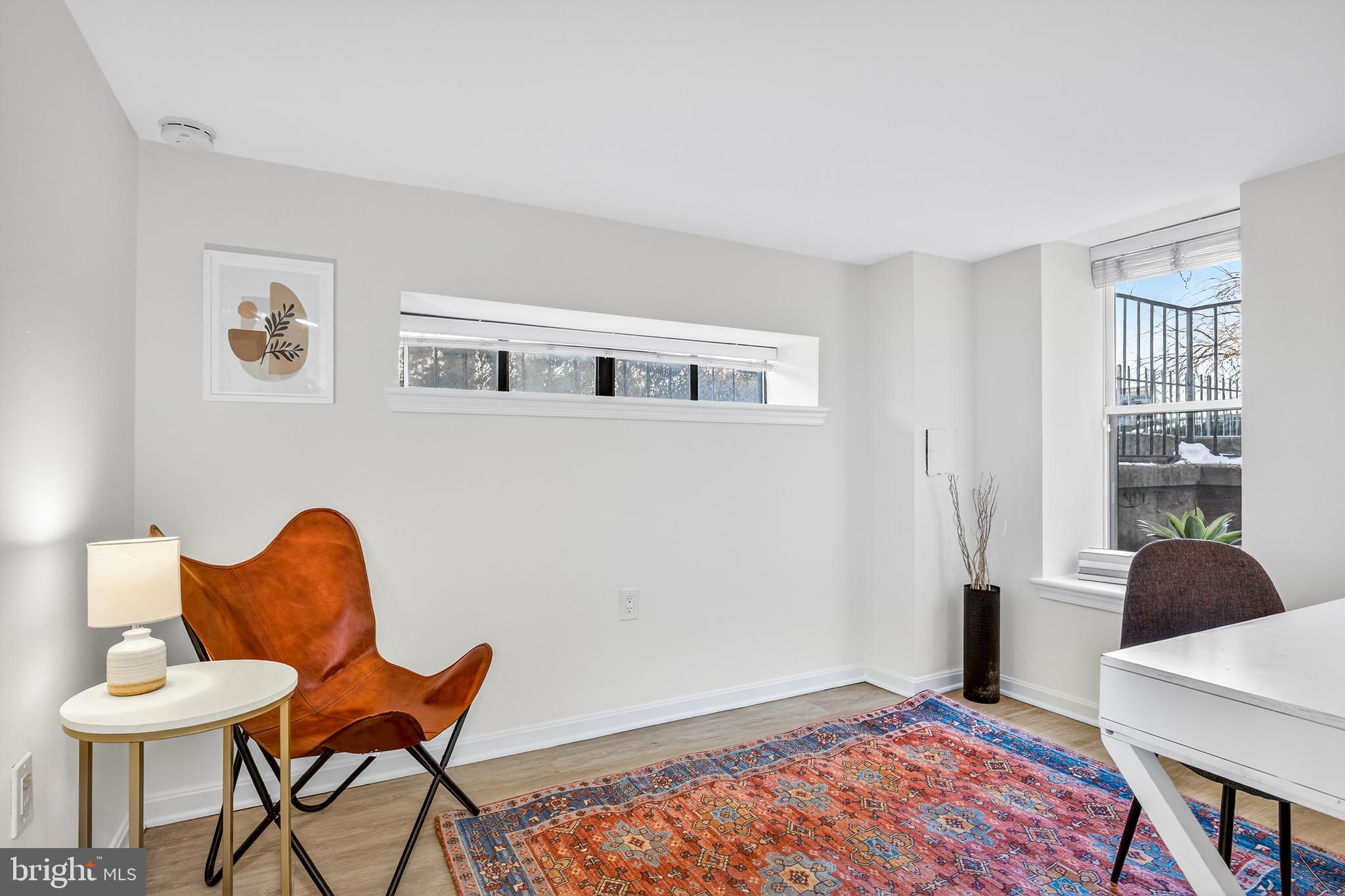 1438 Meridian Place Northwest, Unit LL1 Washington, DC 20010 - Photo 11 of 18 a workspace with furniture and a window