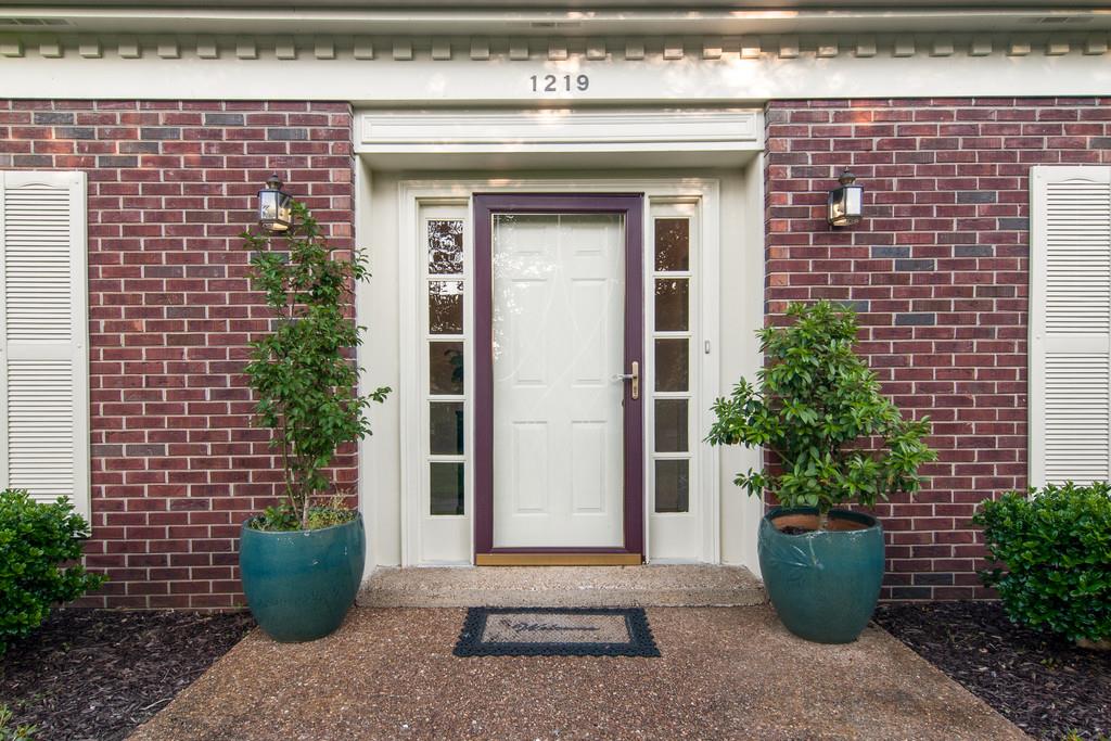 1219 General George Patton Road Nashville, TN 37221 - Photo 3 of 18 a view of a potted plant in front of a building