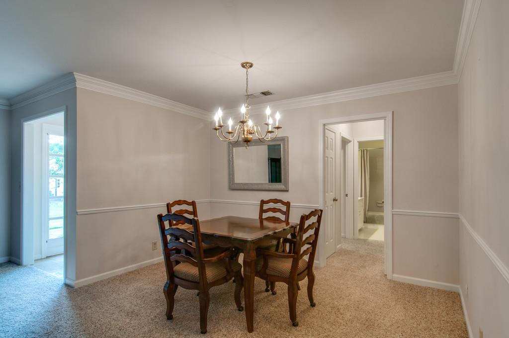 1219 General George Patton Road Nashville, TN 37221 - Photo 7 of 18 a view of a dining room with furniture and chandelier
