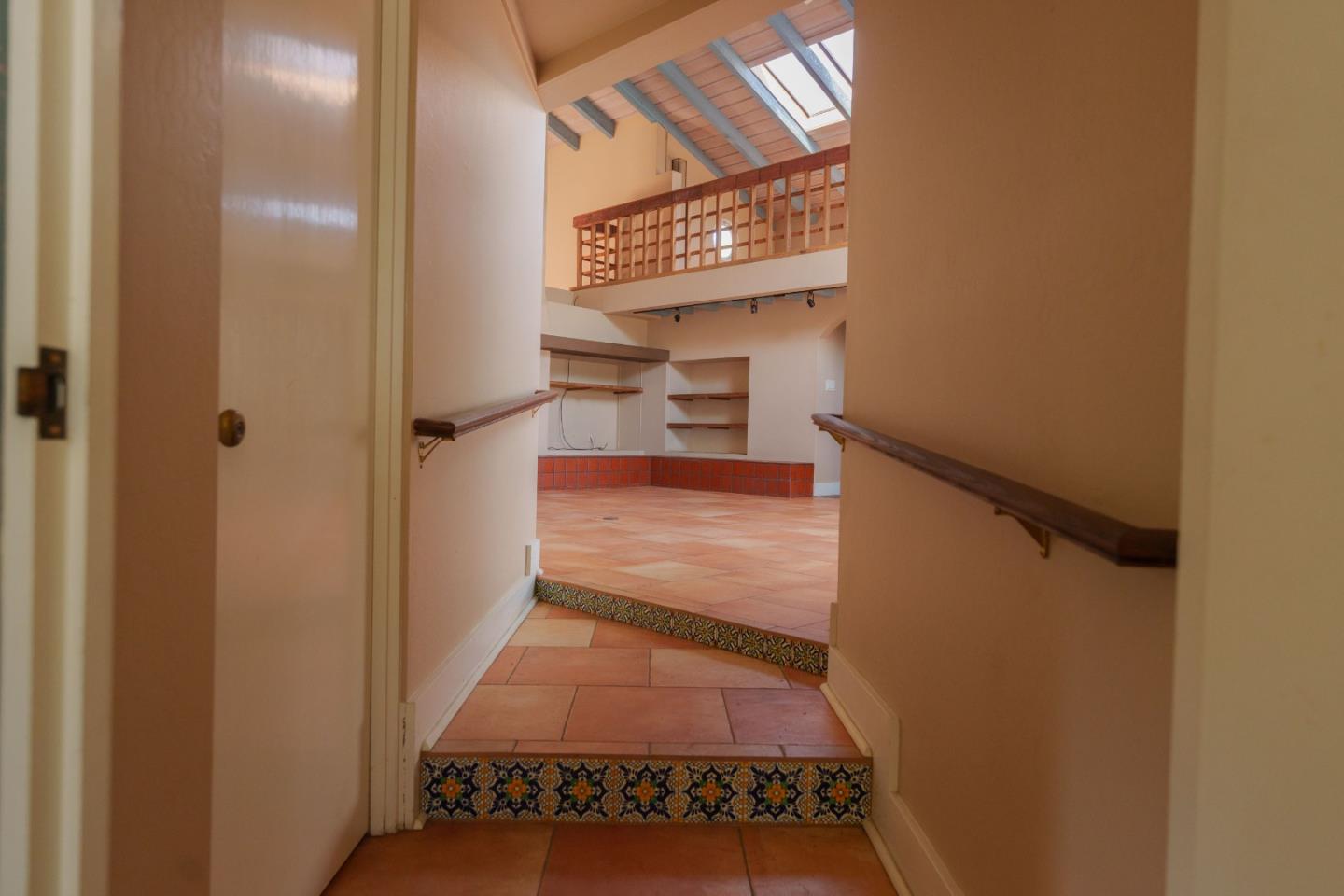 1352 River Road Salinas, CA 93908 - Photo 18 of 33 a view of a hallway with wooden floor and staircase