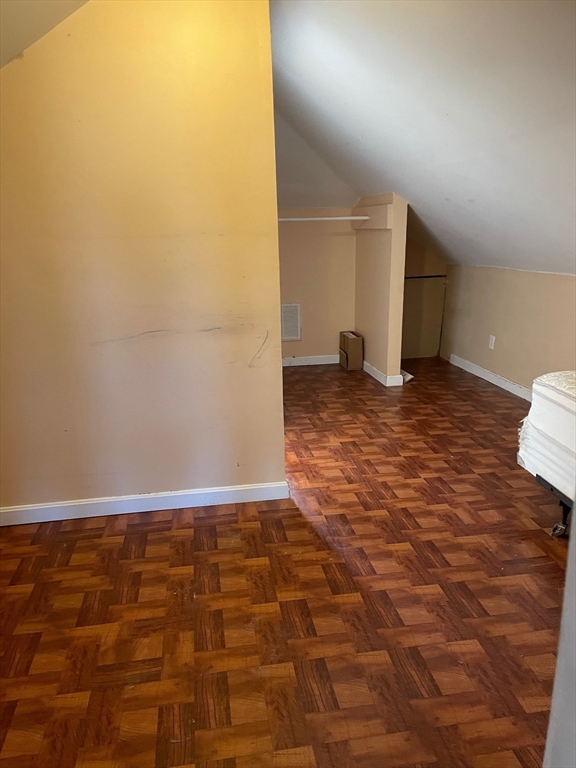 257 Common Street, Unit 2 Watertown, MA 02472 - Photo 20 of 30 a view of a room with wooden floor