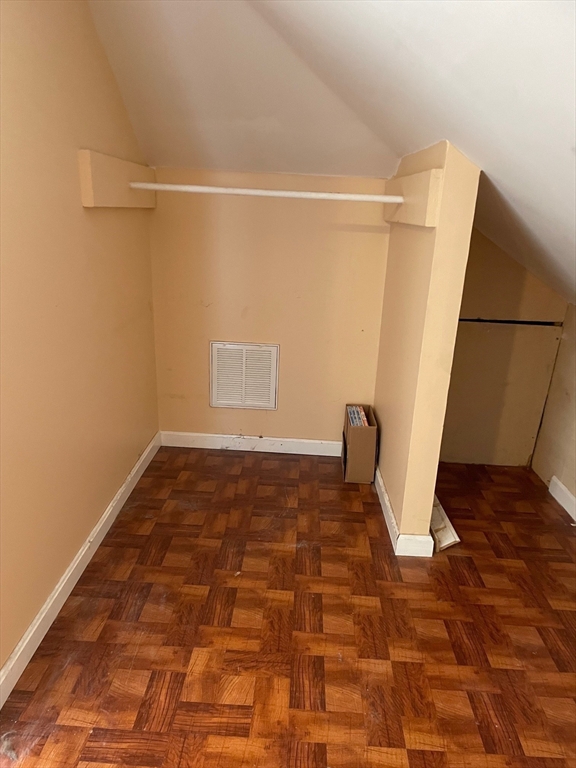 257 Common Street, Unit 2 Watertown, MA 02472 - Photo 25 of 30 a view of a room with wooden floor and a sink
