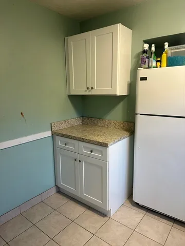 a utility room with washer and dryer