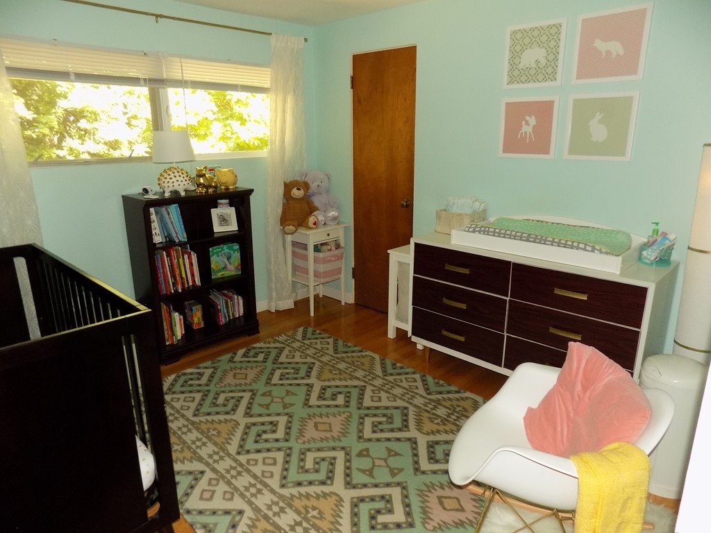 46 Audley Road Springfield, MA 01118 - Photo 4 of 14 a bedroom with a bed and a window