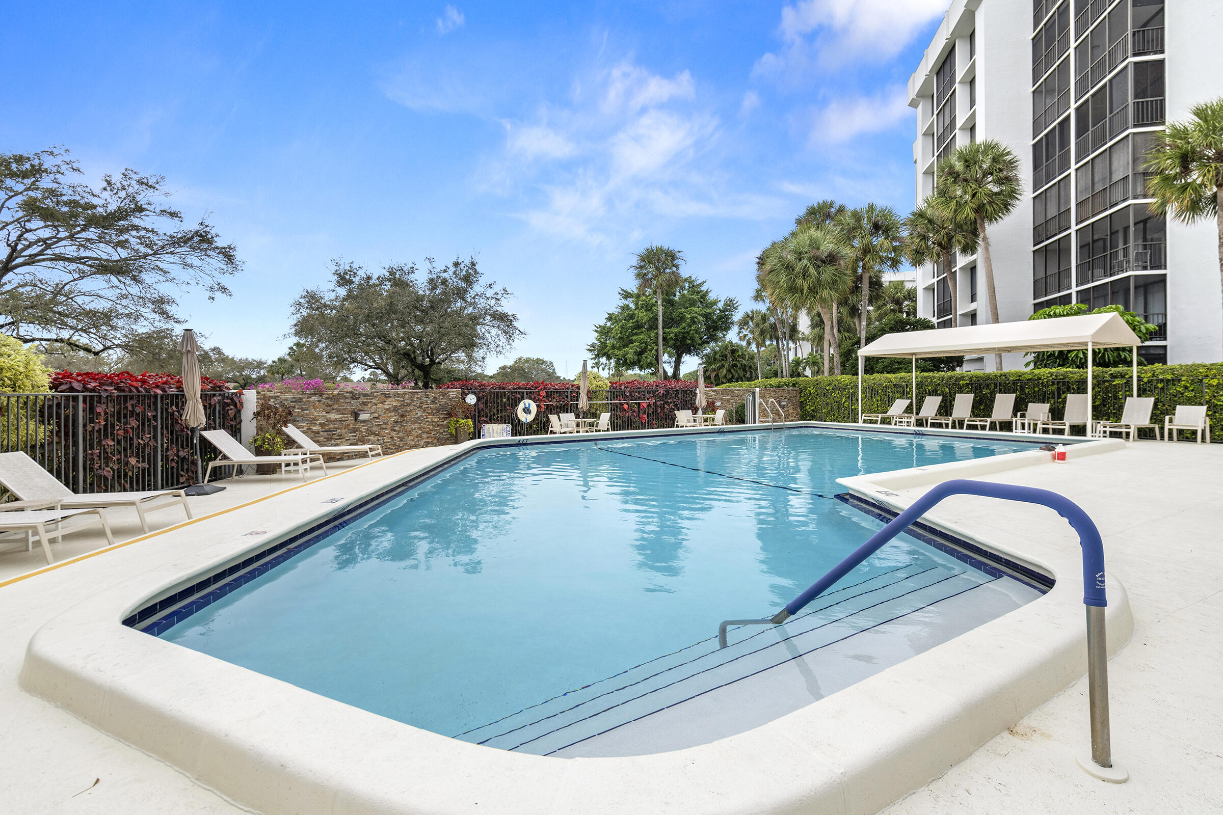 6845 Willow Wood Drive, Unit 3012 Boca Raton, FL 33434 - Photo 26 of 28 a view of swimming pool with outdoor seating
