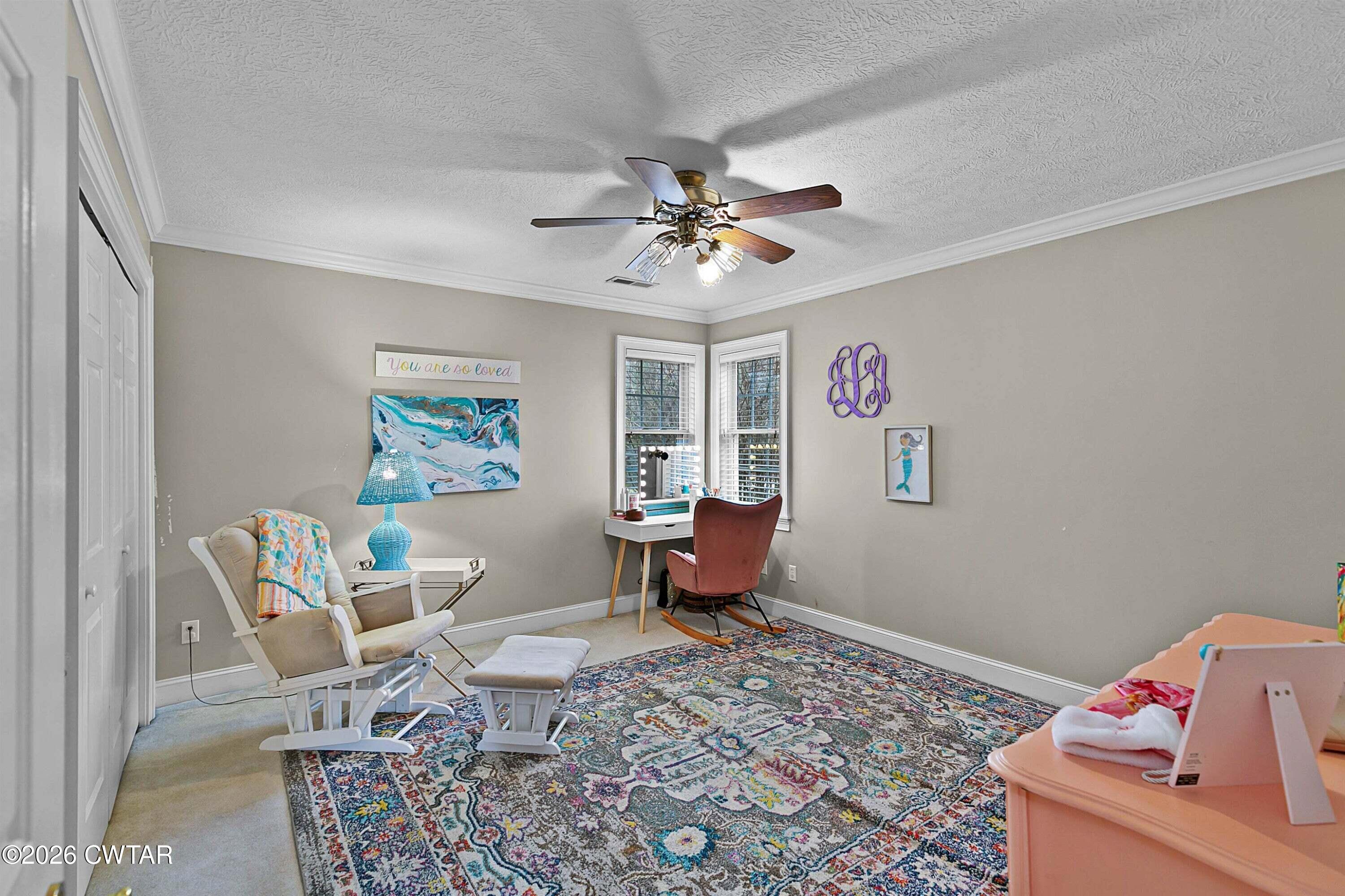 255 Oak Ridge Drive Henderson, TN 38340 - Photo 18 of 23 a living room with furniture and a window