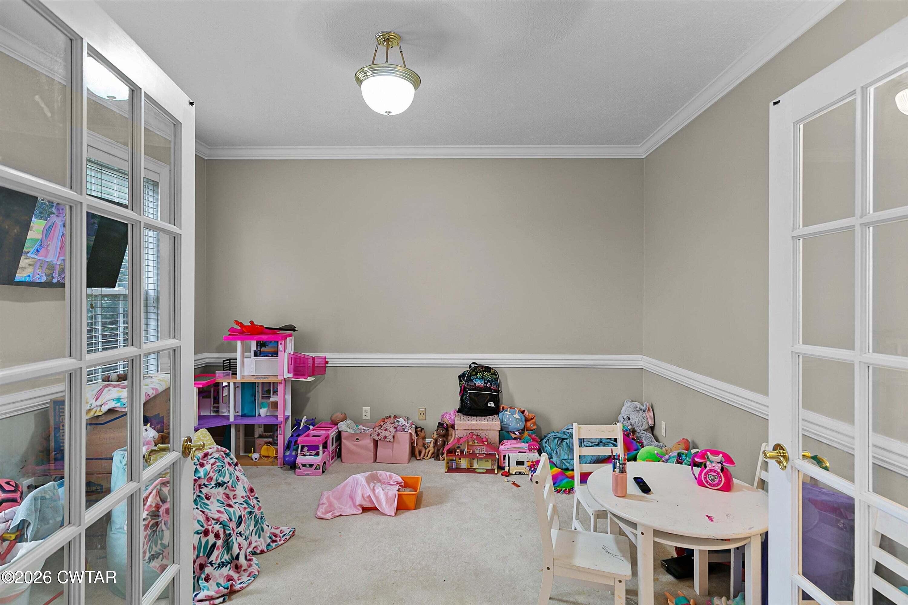 255 Oak Ridge Drive Henderson, TN 38340 - Photo 21 of 23 a play room with toys