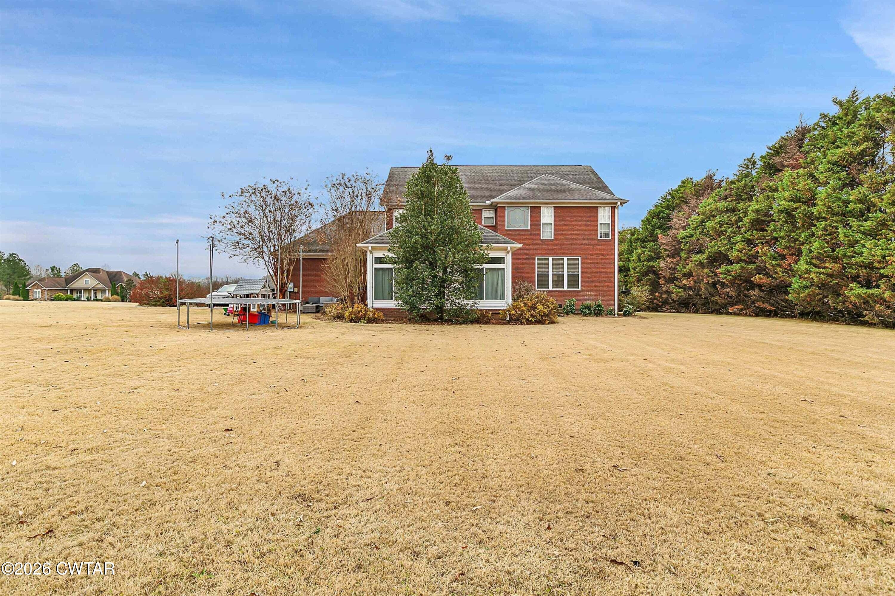 255 Oak Ridge Drive Henderson, TN 38340 - Photo 3 of 23 a view of houses with a outdoor space