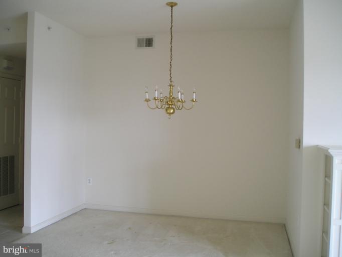 19375 Cypress Ridge Terrace, Unit 1105 Leesburg, VA 20176 - Photo 16 of 17 Dining Room